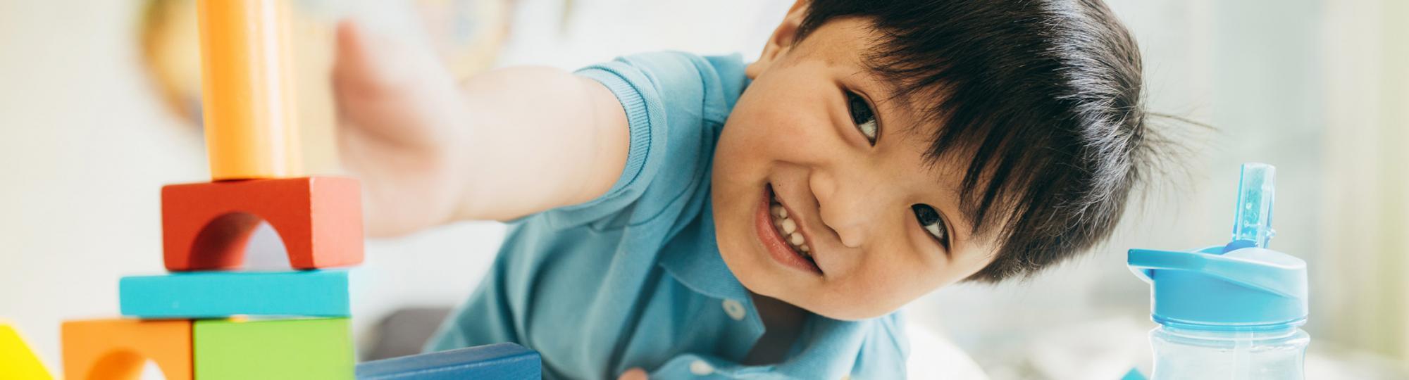 child playing with blocks